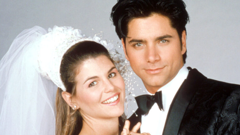 Lori Loughlin as Becky and John Stamos as Jesse get married in Full House