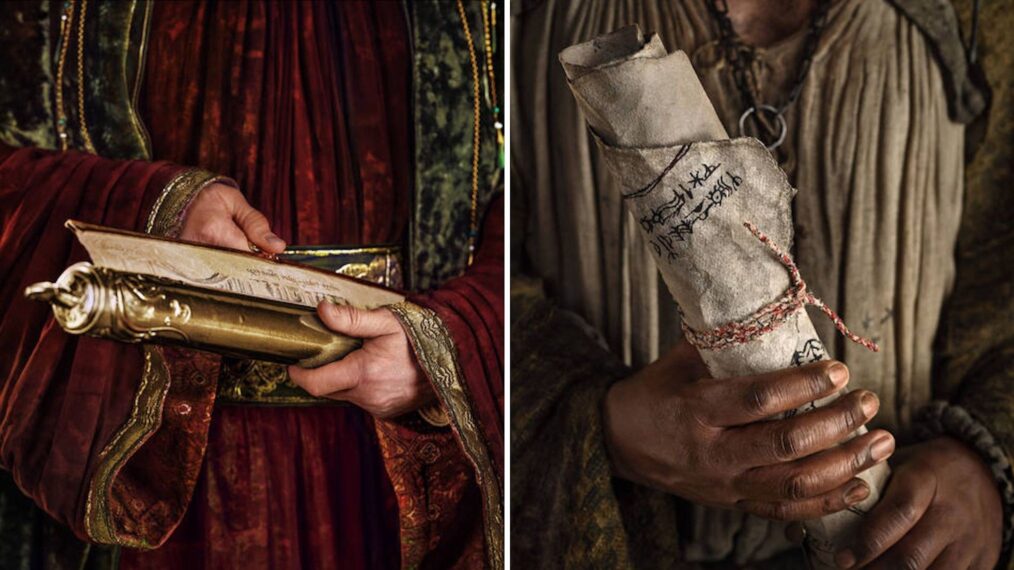 Edward Charles as Celebrimbor and Lenny Henry as Sadoc Burrows in 'The Lord of the Rings: The Rings of Power' hands posters