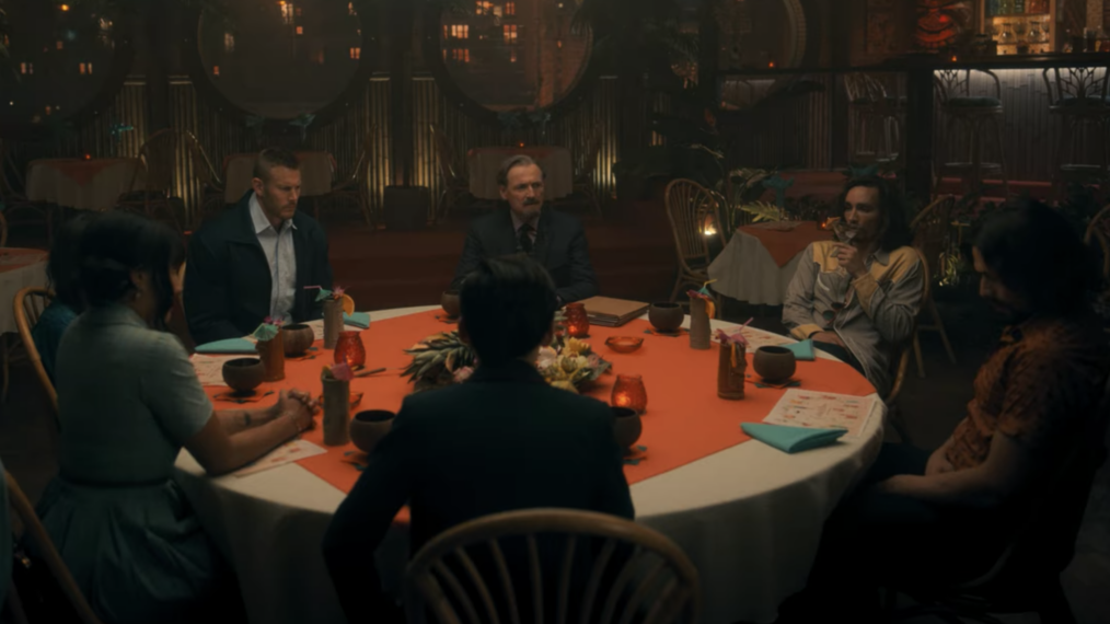 The Hargreeves kids and Sir Reginald sit around the dinner table in Umbrella Academy Season 2.