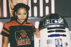 Amandla Stenberg with R2D2 at SDCC 2022