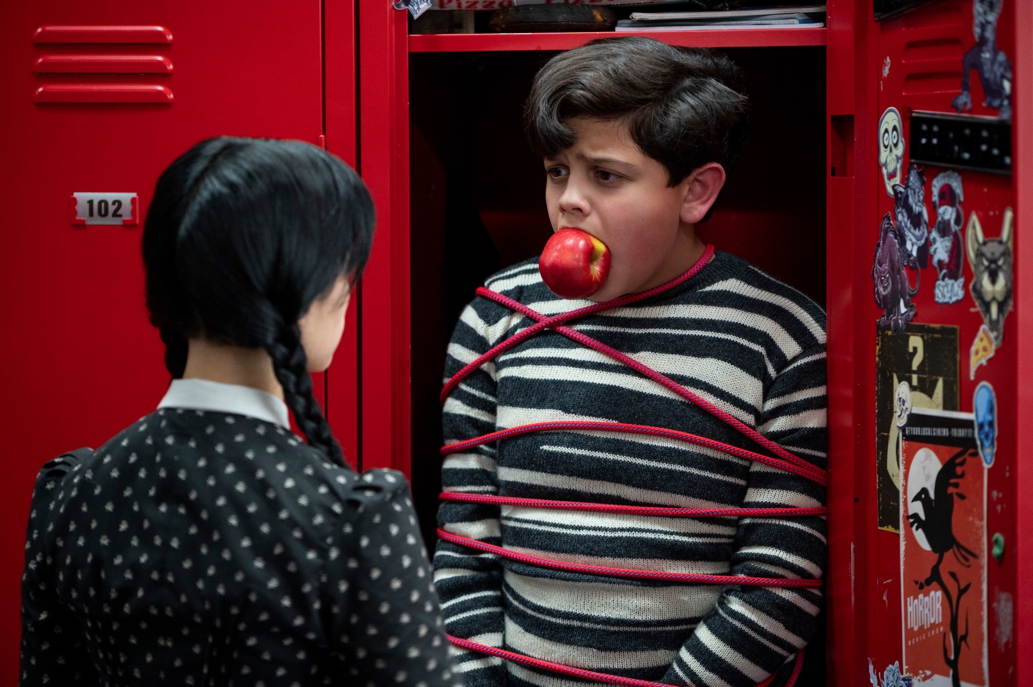 Jenna Ortega as Wednesday Addams, Issac Ordonez as Pugsley Addams in Wednesday