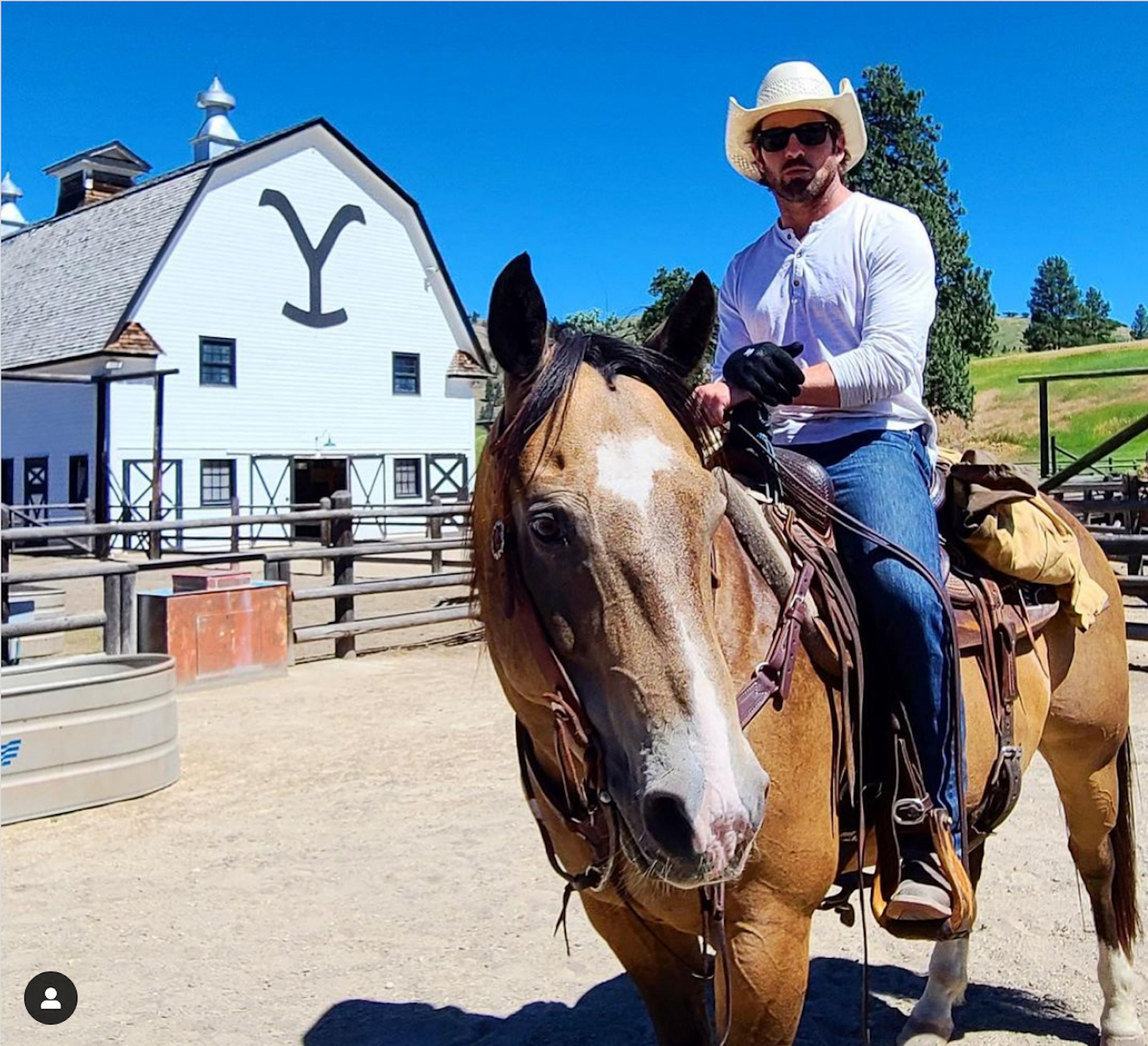 Ian Bohen riding a horse on the Yellowstone farm