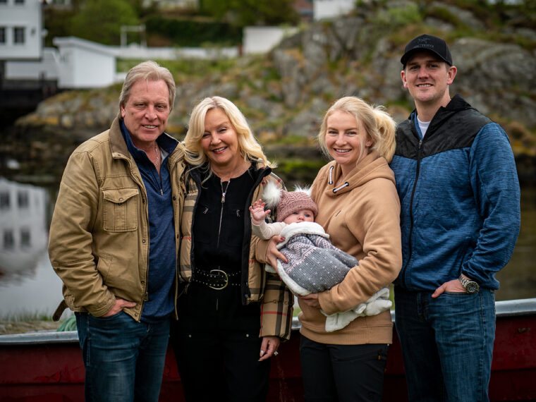 Sig Hansen, June Hansen, Mandy Hansen holding baby, and Clark Pederson standing together in Deadliest Catch