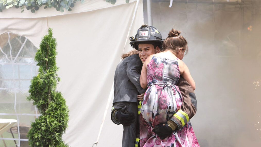 Alberto Rosende as Blake Gallo in Chicago Fire saving two children from a fire