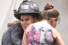 Alberto Rosende as Blake Gallo in Chicago Fire saving two children from a fire