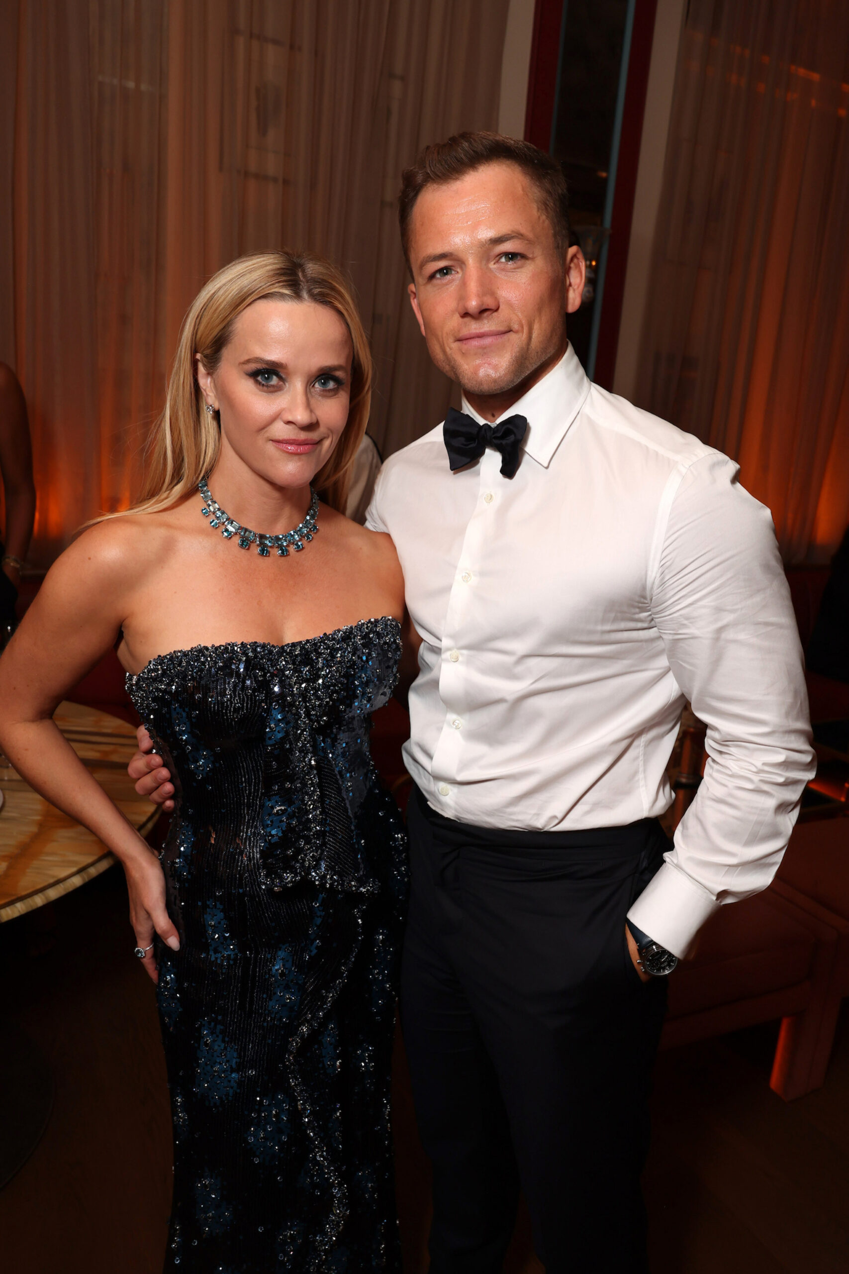 Reese Witherspoon and Taron Egerton attend the Apple TV+ Primetime Emmy Reception