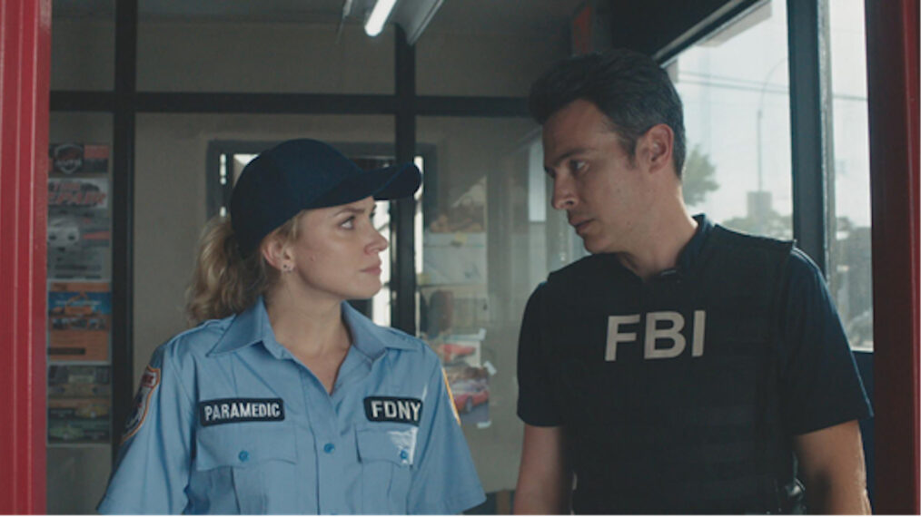 Shantel VanSanten as Nina Chase and John Boyd as Special Agent Stuart Scola in FBI