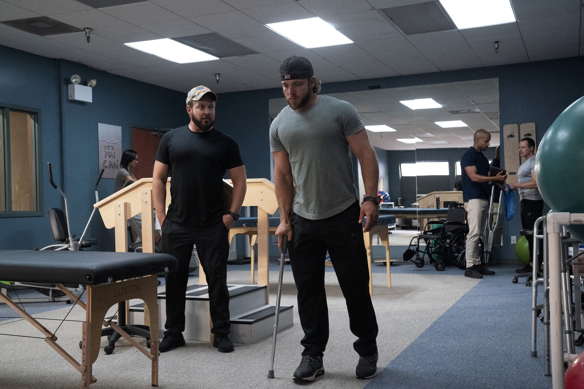 AJ Buckley as Sonny Quinn, Max Thieriot as Clay Spenser in SEAL Team