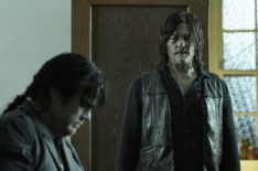 Josh McDermitt as Dr. Eugene Porter and Norman Reedus as Daryl Dixon in The Walking Dead