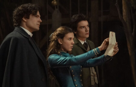 Henry Cavill as Sherlock Holmes, Millie Bobby Brown as Enola Holmes, Louis Partridge as Tewkesbury in 'Enola Holmes 2'