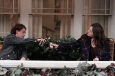 Ethan Cutkosky and Emma Kenney clinking beers on The Conners