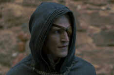 Ewan Mitchell as a cloaked Aemond Targaryen in House of the Dragon - Season 1, Episode 9