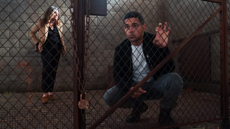 Laura San Giacomo as Dr. Grace Confalone and Wilmer Valderrama as Special Agent Nicholas “Nick” Torres in NCIS