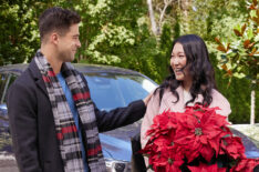 Markian Tarasiuk and Kara Wang in 'Christmas at the Golden Dragon