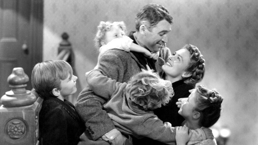 Larry Simms, Jimmy Hawkins, James Stewart, Donna Reed, and Karolyn Grimes in 'It's a Wonderful Life'