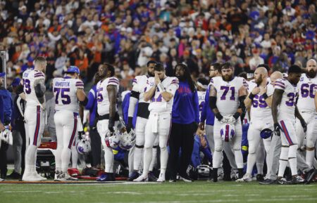 Buffalo Bills players react after teammate Damar Hamlin #3 was injured against the Cincinnati Bengals during the first quarter at Paycor Stadium on January 02, 2023 in Cincinnati, Ohio