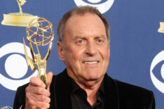 Bruce Gowers poses in the press room with his Emmy