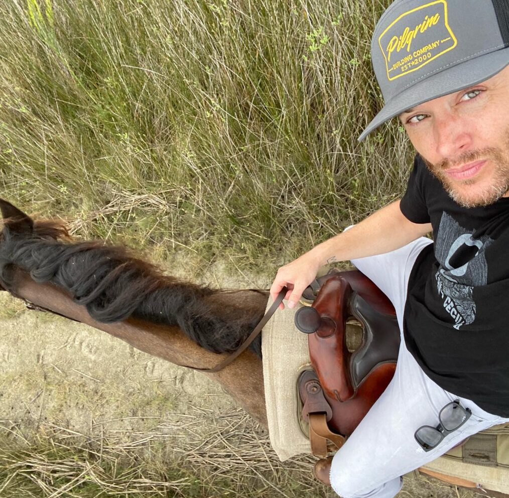 Jensen Ackles on a horse