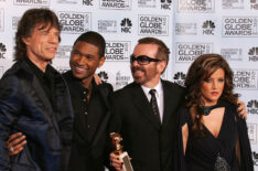 Mick Jagger, Usher, David Stewart, and Lisa Marie Presley and their award for 'Original Song during the 62nd Annual Golden Globe Awards
