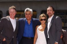 Nicolas Cage and girlfriend, actress Lisa Marie Presley pose with director John Madden and comedian Jay Leno after a hand and footprint ceremony at the famous Grauman's Chinese Theatre