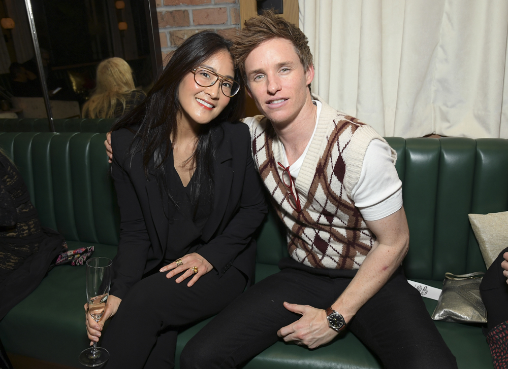 Lisa Nishimura and Eddie Redmayne attend the Netflix Golden Globe and Critics Choice Nominee Toast