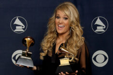 Carrie Underwood poses with her Grammys Best Female Country Vocal Performance for 'Jesus, Take The Wheel' and Best New Artist at the 49th Annual Grammy Awards in February 2007