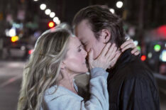 Sarah Jessica Parker and John Corbett share a kiss on And Just Like That set