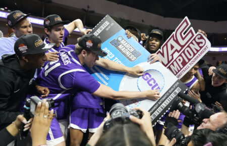 LAS VEGAS, NEVADA - MARCH 11: Logan Landers #21 of the Grand Canyon Antelopes places the GCU sticker on the NCAA ticket for March Madness following their win of the WAC Championship over the Southern Utah Thunderbirds during the Western Athletic Conference Basketball Tournament Championship game at the Orleans Arena on March 11, 2023 in Las Vegas, Nevada. The Antelopes defeated the Thunderbirds 84-66. (Photo by Louis Grasse/Getty Images)