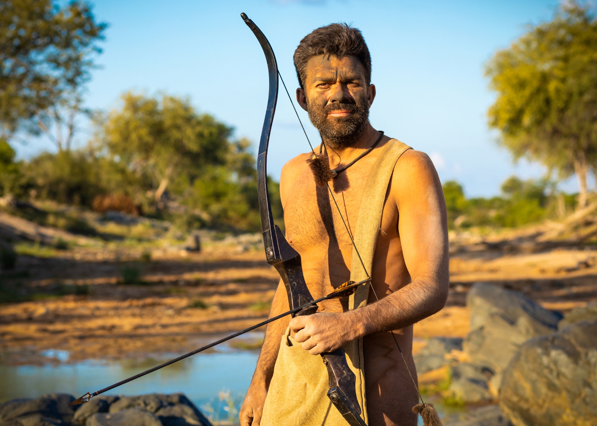 NAASolo Fernando posing with his bow