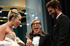 Florence Pugh and Andrew Garfield backstage with Best Adapted Screenplay winner Sarah Polley at the 2023 Oscars