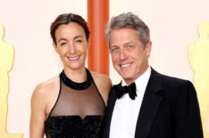 Anna Eberstein and Hugh Grant arrive at the 2023 Oscars