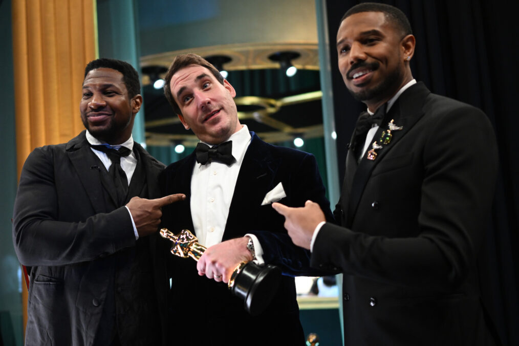 Jonathan Majors and Michael B. Jordan backstage with Best Cinematography winner James Friend at the 2023 Oscars