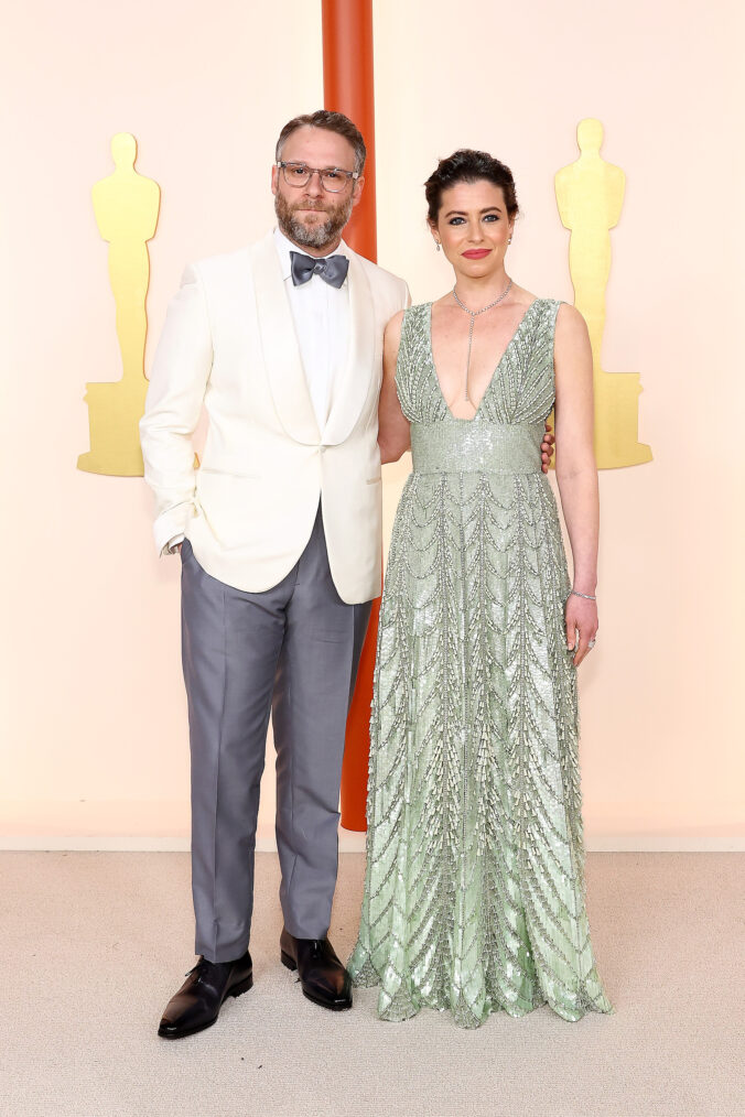 Seth Rogen and Lauren Miller arrive at the 2023 Oscars