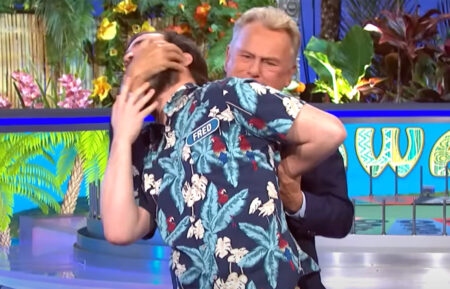 Pat Sajak 'wrestling' winner Fred Fletcher-Jackson on 'Wheel of Fortune' on March 22, 2023