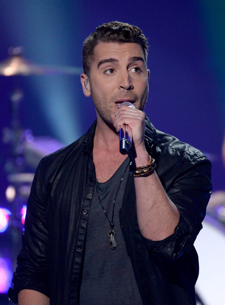 American Idol finalist Nick Fradiani performs onstage with Fallout Boy during 'American Idol' XIV Grand Final