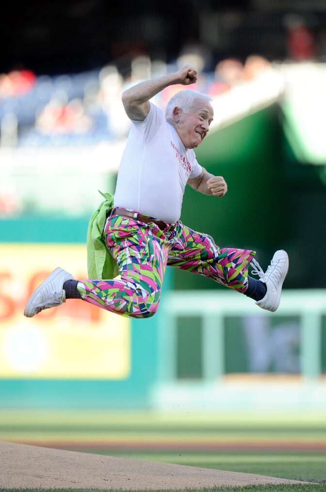 Leslie Jordan celebrates after throwing the first pitch at Chicago Cubs vs. Washington Nationals game on June 14, 2016 in DC