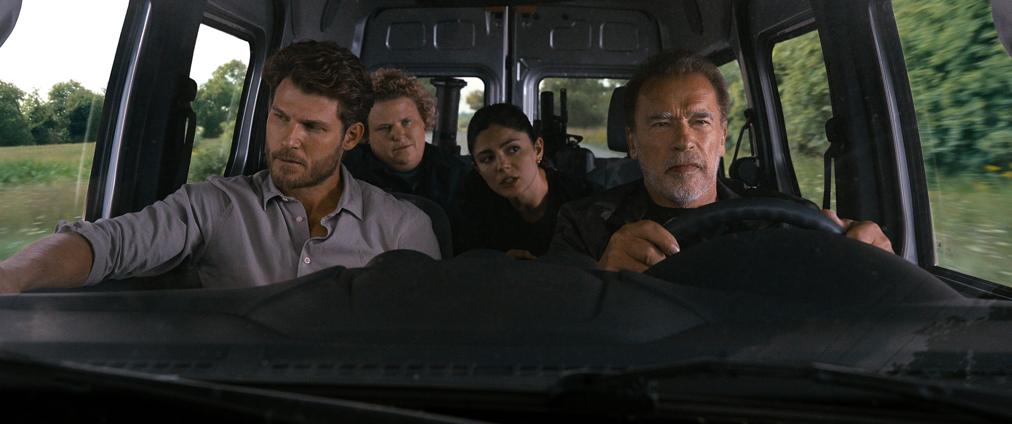Travis Van Winkle, Fortune Feimster, Monica Barbaro, and Arnold Schwarzenegger in 'Fubar'