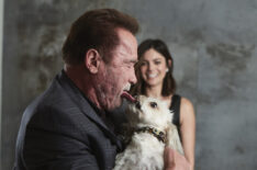 Monica Barbaro and Arnold Schwarzenegger, with Augie, behind the scenes of 'FUBAR' shoot