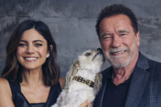 Monica Barbaro and Arnold Schwarzenegger, with Augie, at the 'FUBAR' shoot