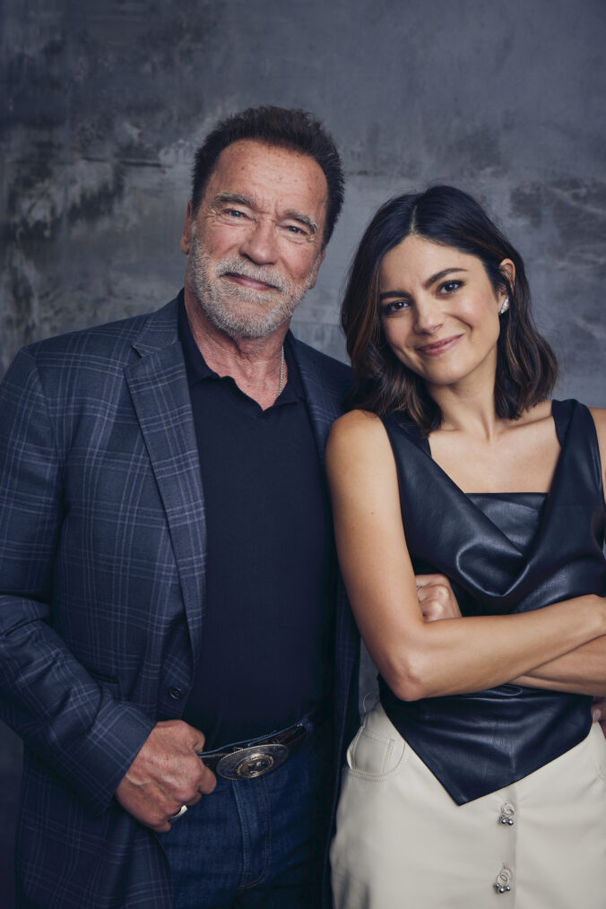 Monica Barbaro and Arnold Schwarzenegger at the 'FUBAR' shoot for TV Insider