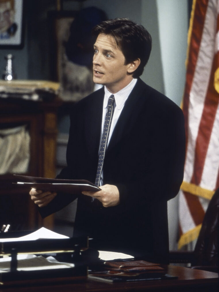 Michael J. Fox as Mike Flaherty in 'Spin City'