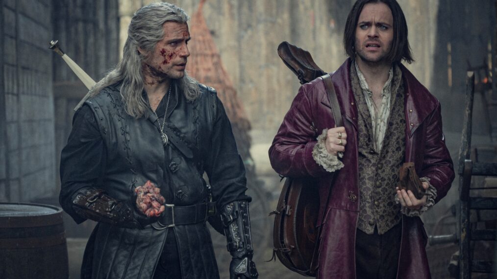 Henry Cavill as Geralt and Joey Batey as Jaskier in The Witcher