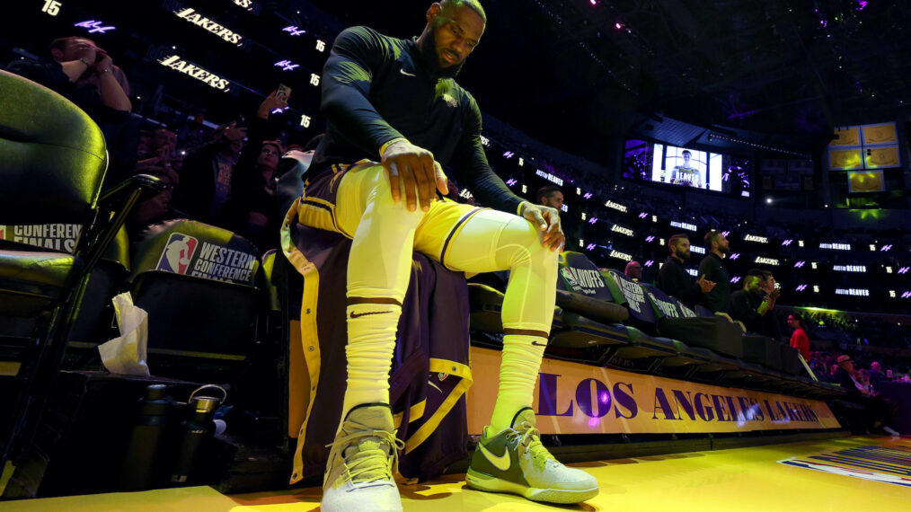 LeBron James of the Los Angeles Lakers sits on the bench prior to game four of the Western Conference Finals against the Denver Nuggets at Crypto.com Arena on May 22, 2023 in Los Angeles, California. NOTE TO USER: User expressly acknowledges and agrees that, by downloading and or using this photograph, User is consenting to the terms and conditions of the Getty Images License Agreement. (Photo by Harry How/Getty Images)