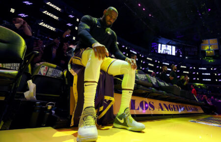 LeBron James of the Los Angeles Lakers sits on the bench prior to game four of the Western Conference Finals against the Denver Nuggets at Crypto.com Arena on May 22, 2023 in Los Angeles, California. NOTE TO USER: User expressly acknowledges and agrees that, by downloading and or using this photograph, User is consenting to the terms and conditions of the Getty Images License Agreement. (Photo by Harry How/Getty Images)