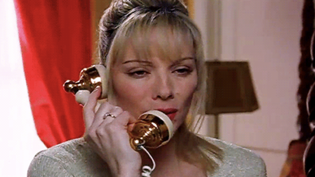 Kim Cattrall as Samantha Jones on the phone in Sex and the City - 'Who Is This?' - Season 1 Episode 8
