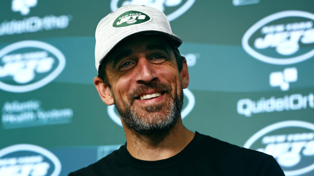 Aaron Rodgers of the New York Jets talks to reporters