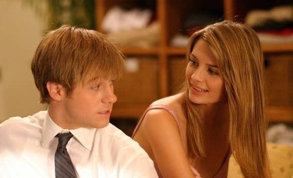 The O.C. - Ben McKenzie as Ryan Atwood-Cohen and Mischa Barton as Marissa Cooper