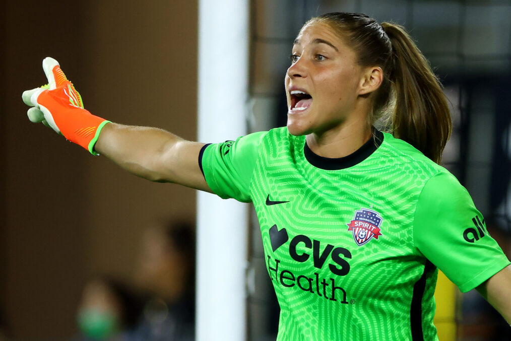 Aubrey Kingsbury #1 of the Washington Spirit yells to teammates during the first half against Angel City FC at Banc of California Stadium on September 21, 2022 in Los Angeles, California