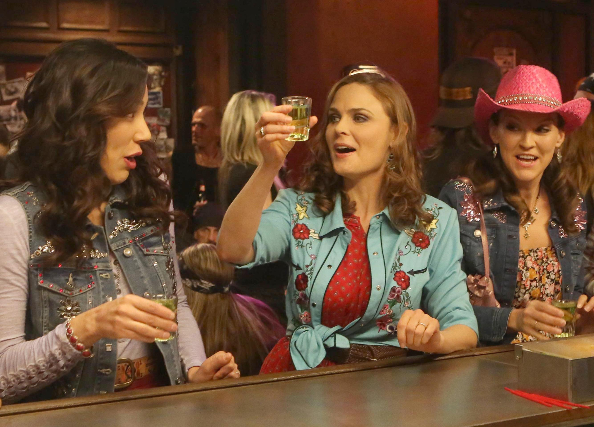 Michaela Conlin, Emily Deschanel, and Carla Gallo in 'Bones'