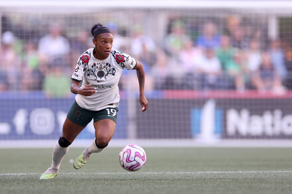 Crystal Dunn #19 of Portland Thorns FC controls the ball against the OL Reign during the first half at Lumen Field on June 03, 2023 in Seattle, Washington